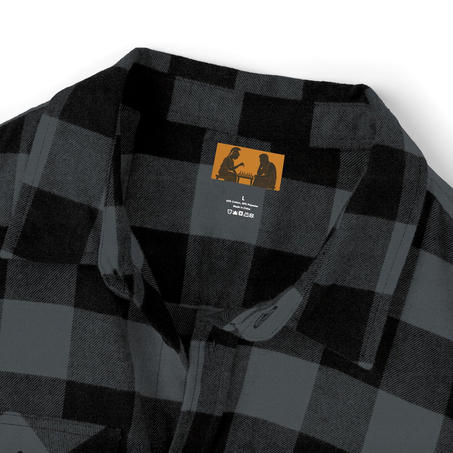 Black and grey FIGWORKS flannel shirt with small embroidered red emblem on the left pocket.”