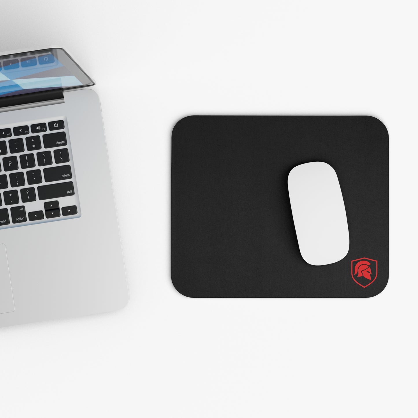 Black mouse pad with a small red FIGWORKS emblem in the bottom corner